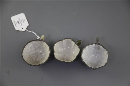 Three Chinese Yixing pewter and jade mounted cups, Daoguang period (1821-50), w. 8cm-8.6cm